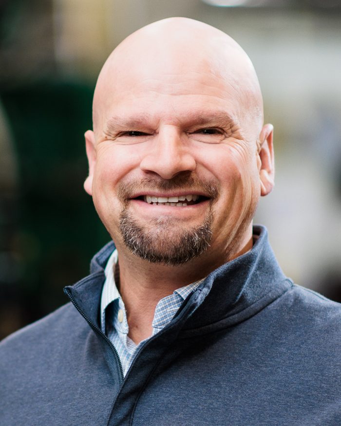 Portrait of Mike Garcia, Director of Corporate Facilities at Alloy Holdings