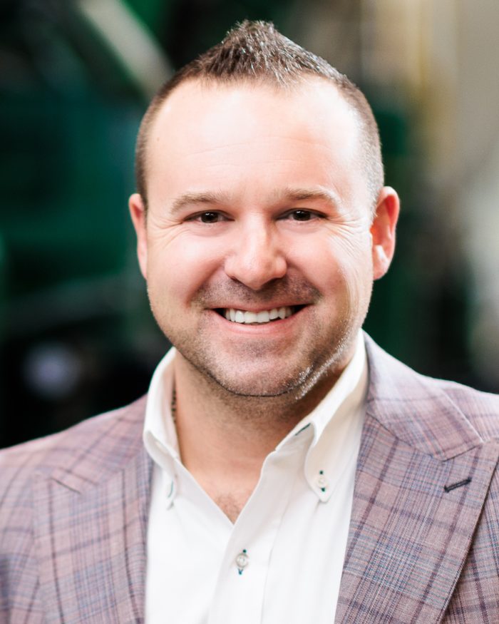 Portrait of Ryan Powers, Senior VP of Operations at Alloy Holdings